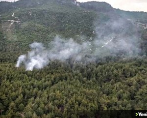 Osmaniye'de ormanlık ve örtülük alanda çıkan yangına müdahale ediliyor