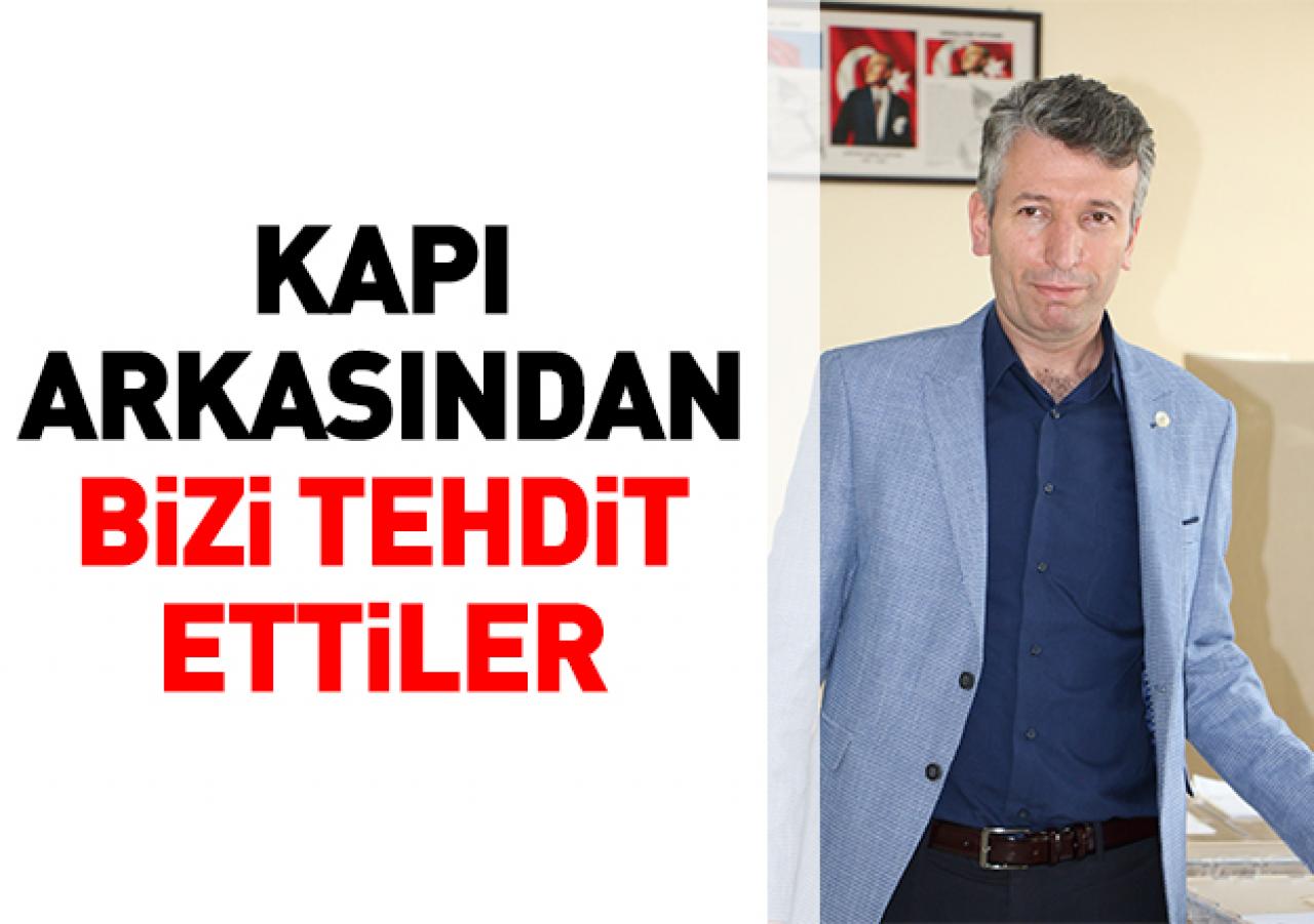 Kapı arkasından bizi tehdit ettiler