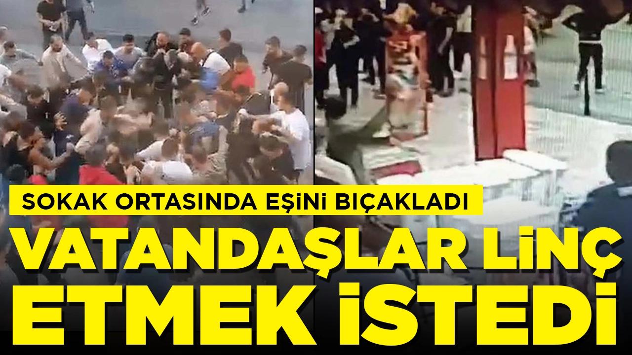 Sokak ortasında eşini bıçakladı: Şüpheliyi linç etmek istediler