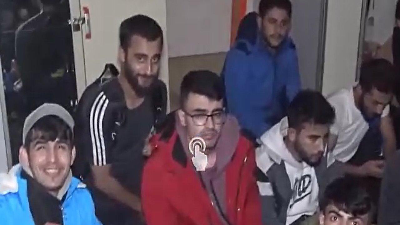 Evlerine baskın yapılan kaçak göçmenler kuruyemiş yemeye devam etti!