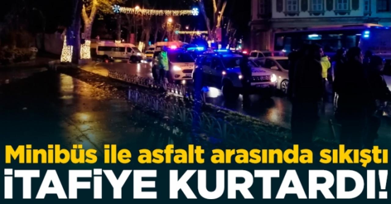 Asfalt ve minibüs arasına sıkışan sürücüyü itfaiye kurardı