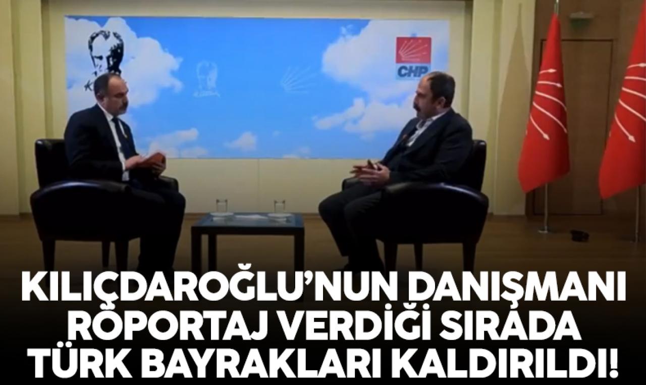 Kemal Kılıçdaroğlu'nun danışmanı Nuşirevan Elçi röportaj verdiği sırada Türk bayrakları kaldırıldı