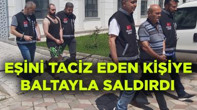 Eşini taciz eden kişiye baltayla saldırdı