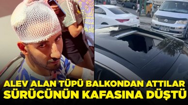 İnanılması güç olay: Alev alan tüp, otomobilin cam tavanını kırarak sürücünün kafasına düştü