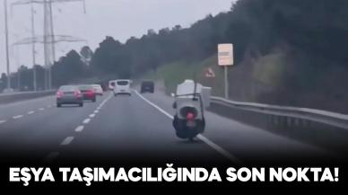 Eşya taşımacılığında son nokta! Motosikletin üstünde beyaz eşya taşıdı