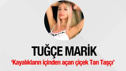 Kayalıkların içinden açan çiçek Tan Taşçı