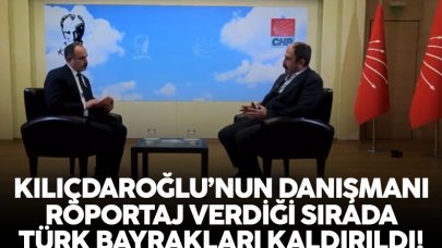 Kemal Kılıçdaroğlu'nun danışmanı Nuşirevan Elçi röportaj verdiği sırada Türk bayrakları kaldırıldı